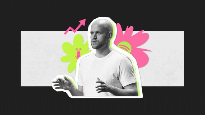 Spotify Ceo Daniel Ek In Black And White, Giving A Presentation With Colourful Logo Background 