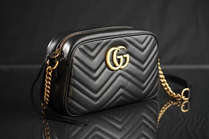 Black Gucci Handbag With Gg Logo And Gold Chain