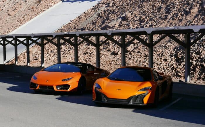 Two Orange Sports Cars Parked Up - Automotive Brands On Tiktok Are Getting Real Marketing Success